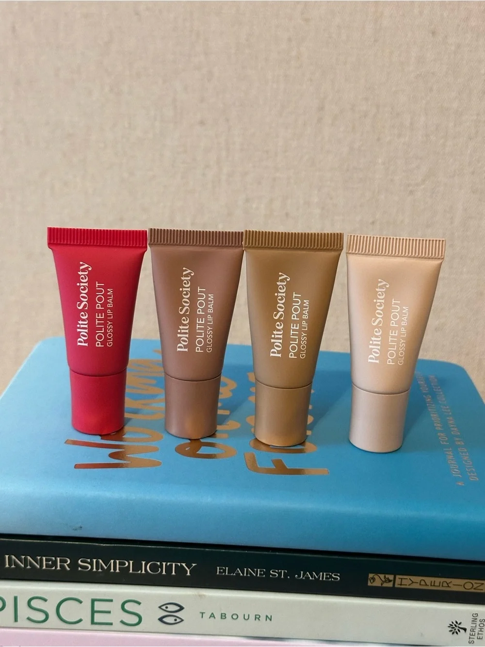 Polite Society Glossy Mini Lip Balm Set — Red, Brown, Tan, Cream